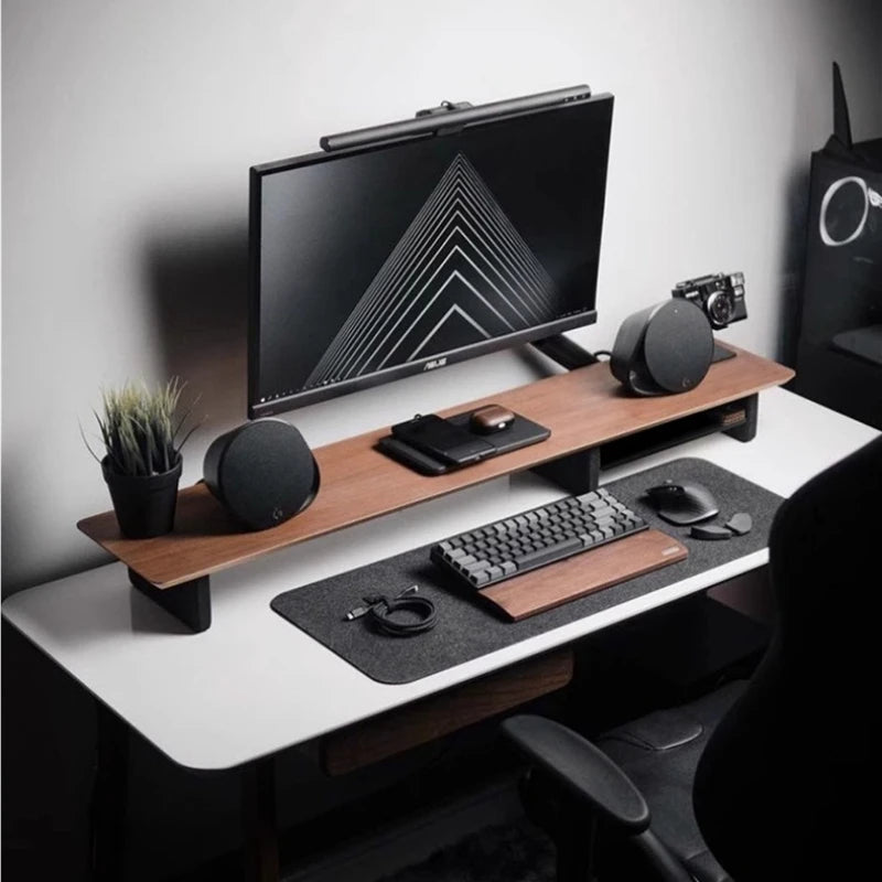 Black Walnut Monitor Stand in use on a minimalist desk setup
