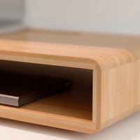 Belcrest bamboo monitor riser with drawer and open storage, natural wood grain finish.