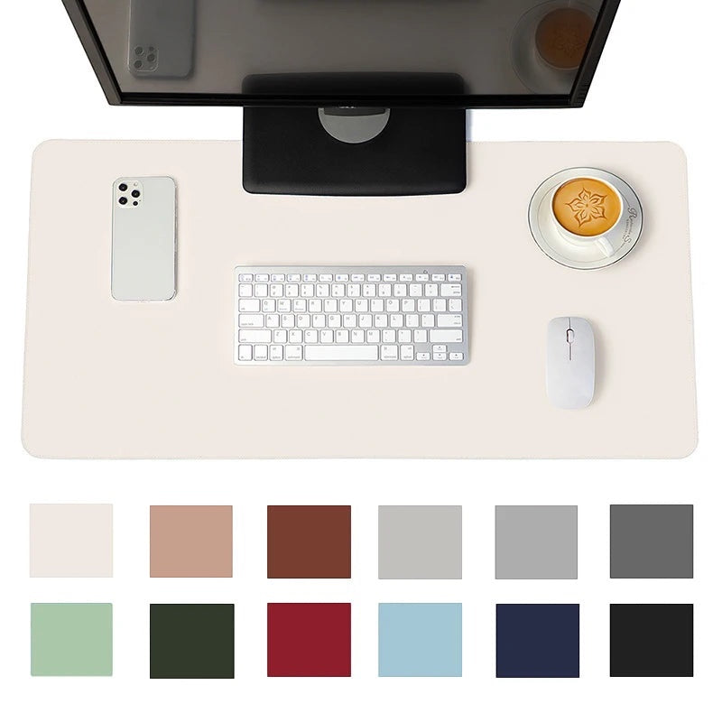 Belcrest large desk mat protector in cream, featuring a keyboard, mouse, phone, and coffee cup.