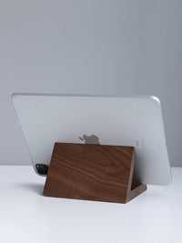 Belcrest modern wooden tablet stand in natural wood grain, holding a silver tablet at an optimal viewing angle.