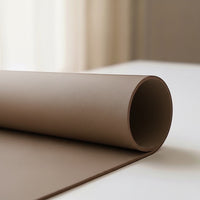 Belcrest reversible desk pad in taupe vegan leather, ideal for work and grip.