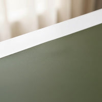 Belcrest reversible desk pad in olive green vegan leather with a white edge. Smooth texture for writing and mouse use.