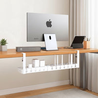Belcrest white metal retractable under desk cable management tray with clamps, holding power strips and cables.